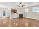 Spacious living room featuring a fireplace, hardwood floors, and abundant natural light at 1100 N North Village Drive Dr, Decatur, GA 30032