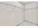 Empty walk-in closet with installed shelving, ready to be organized at 1100 N North Village Drive Dr, Decatur, GA 30032