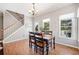 Bright dining area with a chandelier and a view to the backyard at 237 Elmbrook Ln, Canton, GA 30114