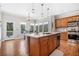 Bright kitchen with an island, stainless steel appliances, and view to backyard at 237 Elmbrook Ln, Canton, GA 30114