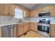 Kitchen featuring stainless steel appliances and plentiful cabinet storage at 26 Wey Bridge Ct, White, GA 30184