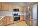 Kitchen featuring stainless steel appliances and plentiful cabinet storage at 26 Wey Bridge Ct, White, GA 30184