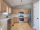 Kitchen featuring stainless steel appliances and plentiful cabinet storage at 26 Wey Bridge Ct, White, GA 30184