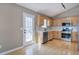 Well-lit kitchen with stainless steel appliances and plenty of counter space at 26 Wey Bridge Ct, White, GA 30184