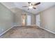 Inviting living room with neutral tones and ample natural light at 26 Wey Bridge Ct, White, GA 30184