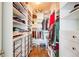 Walk-in closet featuring built-in shelves, hanging racks, and drawers for ample storage at 3777 Peachtree Ne Rd # 722, Brookhaven, GA 30319