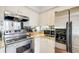 A well-equipped kitchen featuring stainless steel appliances, and bright white cabinets at 3777 Peachtree Ne Rd # 722, Brookhaven, GA 30319