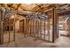 Spacious unfinished basement with exposed ductwork and stud walls ready for customization at 5080 Riverlake Dr, Peachtree Corners, GA 30097