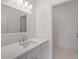 Bathroom featuring a modern vanity and white tile floors at 5080 Riverlake Dr, Peachtree Corners, GA 30097