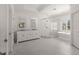 Bathroom featuring double sinks, soaking tub, and glass shower at 5080 Riverlake Dr, Peachtree Corners, GA 30097