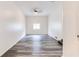 Bright living room features hardwood floors and neutral walls at 8169 Kendrick Rd, Jonesboro, GA 30238