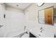 Bright bathroom with a tiled shower-tub combination and a sleek vanity sink at 181 Powell Se St # 12, Atlanta, GA 30316