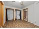 Laundry room with black accents, washer, dryer, and wood-style flooring at 3107 Hammock Creek Ct, Conyers, GA 30012