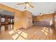 Bright sunroom featuring wood paneled walls, hardwood floors, and a seamless transition to the outdoors at 3107 Hammock Creek Ct, Conyers, GA 30012