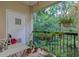 Outdoor balcony showcasing lush greenery, potted plants and a seating area at 3636 Habersham Rd # 2307, Atlanta, GA 30305