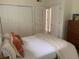 Bright bedroom featuring a comfortable bed and white closet doors at 3636 Habersham Rd # 2307, Atlanta, GA 30305