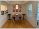 Dining room with hardwood floors and neutral paint and modern decor at 3636 Habersham Rd # 2307, Atlanta, GA 30305