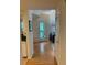 Hallway with hardwood floors and a view of the front door and living room at 3636 Habersham Rd # 2307, Atlanta, GA 30305