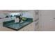 Kitchen area features light cabinets and green countertop at 3636 Habersham Rd # 2307, Atlanta, GA 30305