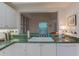Kitchen space features white cabinets and green countertop at 3636 Habersham Rd # 2307, Atlanta, GA 30305