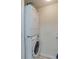 Laundry closet featuring a stacked washing machine and dryer at 3636 Habersham Rd # 2307, Atlanta, GA 30305
