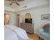 Bright main bedroom features ensuite access and large dresser at 3636 Habersham Rd # 2307, Atlanta, GA 30305