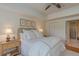 Bright main bedroom features ensuite access and two bedside tables at 3636 Habersham Rd # 2307, Atlanta, GA 30305