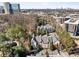 Stunning aerial view of the property with city views and lush landscaping at 4007 Westchester Ne Rdg, Brookhaven, GA 30329
