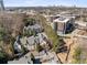 Aerial view of the property and surrounding neighborhood with views of the city skyline at 4007 Westchester Ne Rdg, Brookhaven, GA 30329