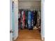 Walk-in closet with ample hanging space and shelving for optimal storage at 4007 Westchester Ne Rdg, Brookhaven, GA 30329
