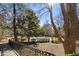 Enjoy a community tennis court surrounded by mature trees and lush greenery at 4007 Westchester Ne Rdg, Brookhaven, GA 30329