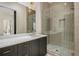 Bathroom featuring single vanity with marble countertops and a glass shower at 165 Breakspear Ln, Fayetteville, GA 30214