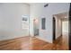 Sun-filled bedroom featuring hardwood floors, and a modern style at 165 Breakspear Ln, Fayetteville, GA 30214