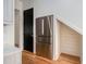 Kitchen nook featuring a stainless steel refrigerator and modern design elements at 165 Breakspear Ln, Fayetteville, GA 30214