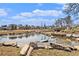 Picturesque water feature and seating area with community homes in the background at 165 Breakspear Ln, Fayetteville, GA 30214