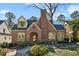 Charming brick home with a meticulously landscaped front yard at 1696 N Pelham Ne Rd, Atlanta, GA 30324