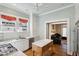 Bright kitchen with gas range, marble countertops, and an island opening to the living room at 1696 N Pelham Ne Rd, Atlanta, GA 30324