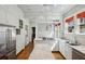 Bright kitchen with marble countertops and stainless steel appliances at 1696 N Pelham Ne Rd, Atlanta, GA 30324