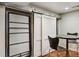 Storage area with barn door and metal table with chairs at 1696 N Pelham Ne Rd, Atlanta, GA 30324