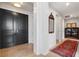 Hallway featuring travertine floors, wooden doors, and a patterned red rug at 3344 Peachtree Ne Rd # 3305, Atlanta, GA 30326