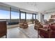 Bright and airy living room with floor to ceiling windows and a panoramic view at 3344 Peachtree Ne Rd # 3305, Atlanta, GA 30326