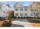 Charming home featuring neutral siding, light blue shutters, and a well-maintained front yard at 4403 Thorngate Ln, Acworth, GA 30101