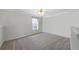 Cozy loft space with carpeting, a window, and neutral walls at 4403 Thorngate Ln, Acworth, GA 30101