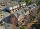 Aerial view of townhomes showcasing the well-planned community layout and landscaping at 4883 Seldon Se Way, Smyrna, GA 30080