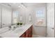 Large bathroom with double sink vanity, white cabinets and tile floors at 4883 Seldon Se Way, Smyrna, GA 30080