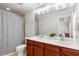 Bathroom featuring double vanity and shower/bath combo with tile surround at 4883 Seldon Se Way, Smyrna, GA 30080