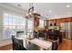 Dining area has windows and adjoins a kitchen with a bar stool eat-in area at 4883 Seldon Se Way, Smyrna, GA 30080