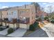 Exterior view of the townhome's rear decks and garages at 4883 Seldon Se Way, Smyrna, GA 30080