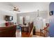 Bright living room with hardwood floors, a ceiling fan, and a view of the entry foyer at 4883 Seldon Se Way, Smyrna, GA 30080