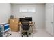 A tidy office space with neutral walls, streamlined desk, and comfortable rolling chair at 4883 Seldon Se Way, Smyrna, GA 30080